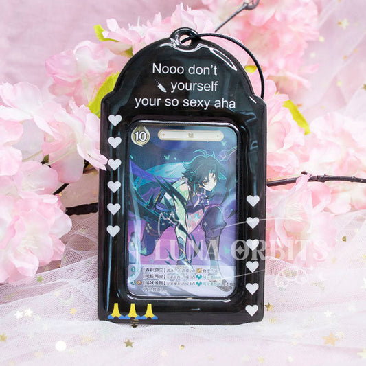 Card holder with anime character design on a pink floral background